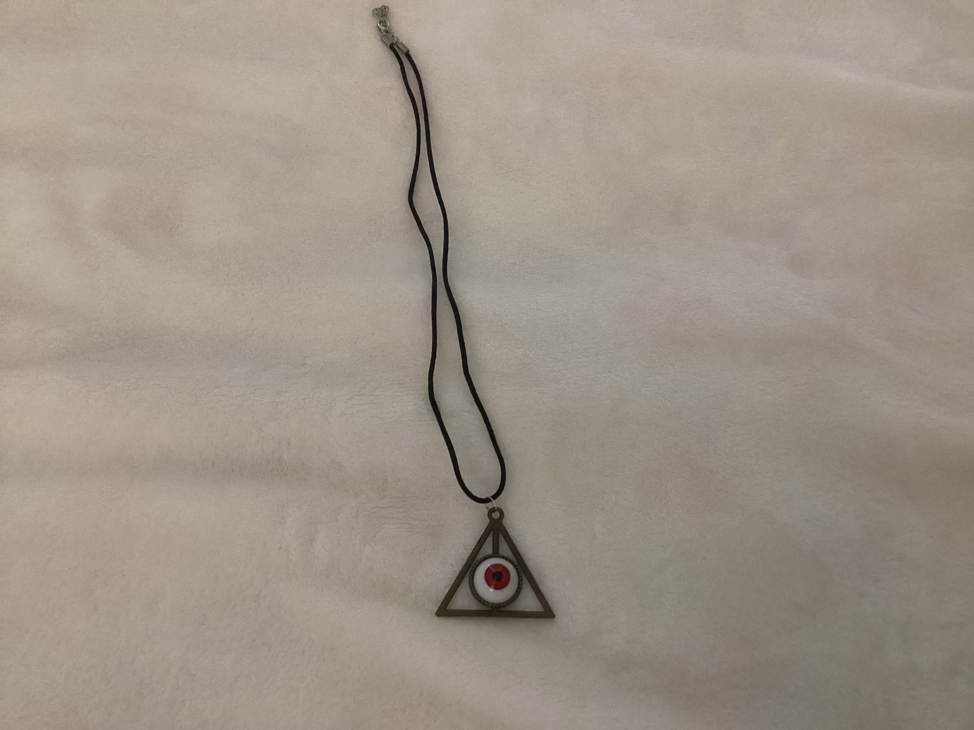 red all-seeing eye pendant