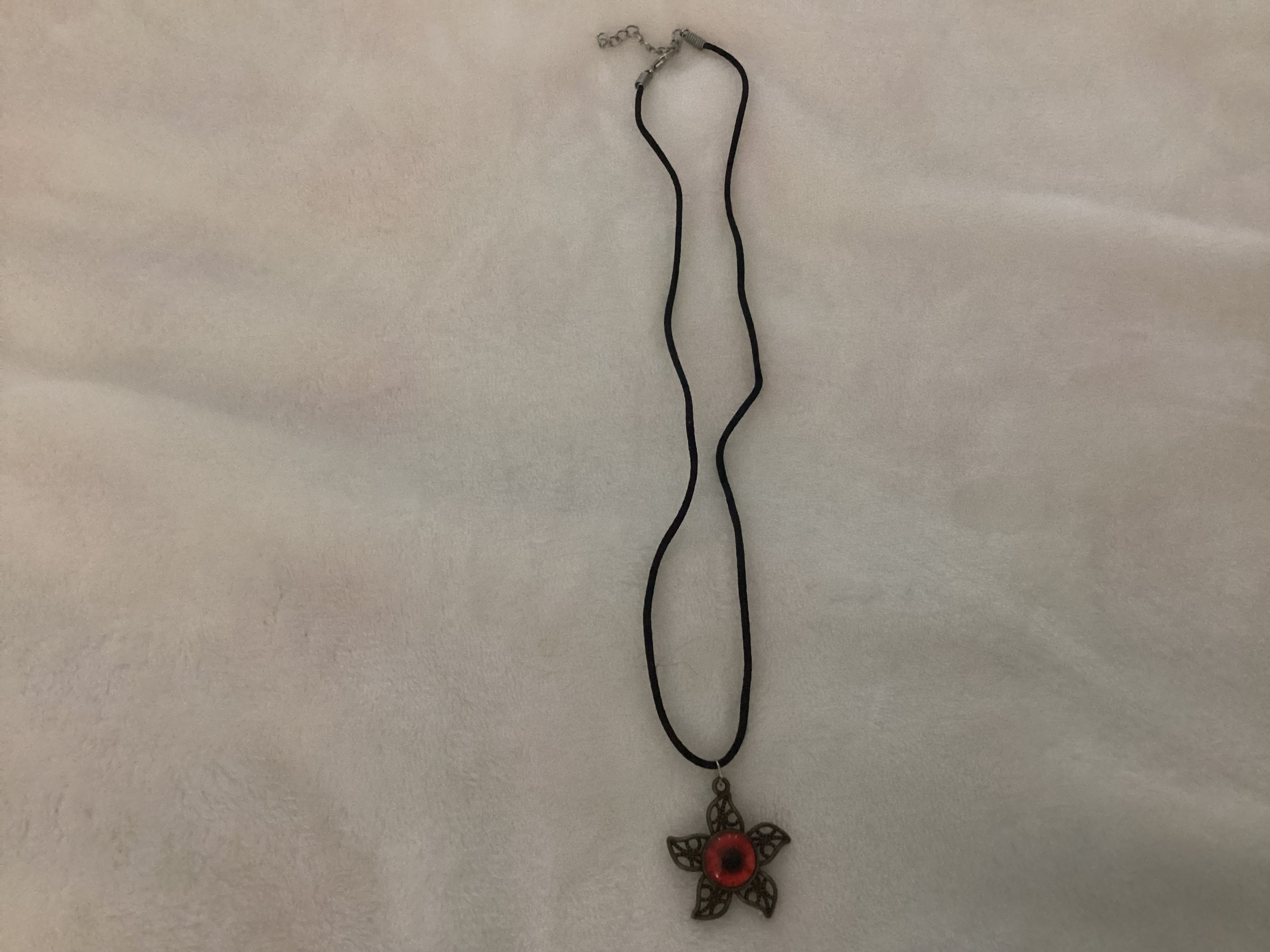 red star eye pendant